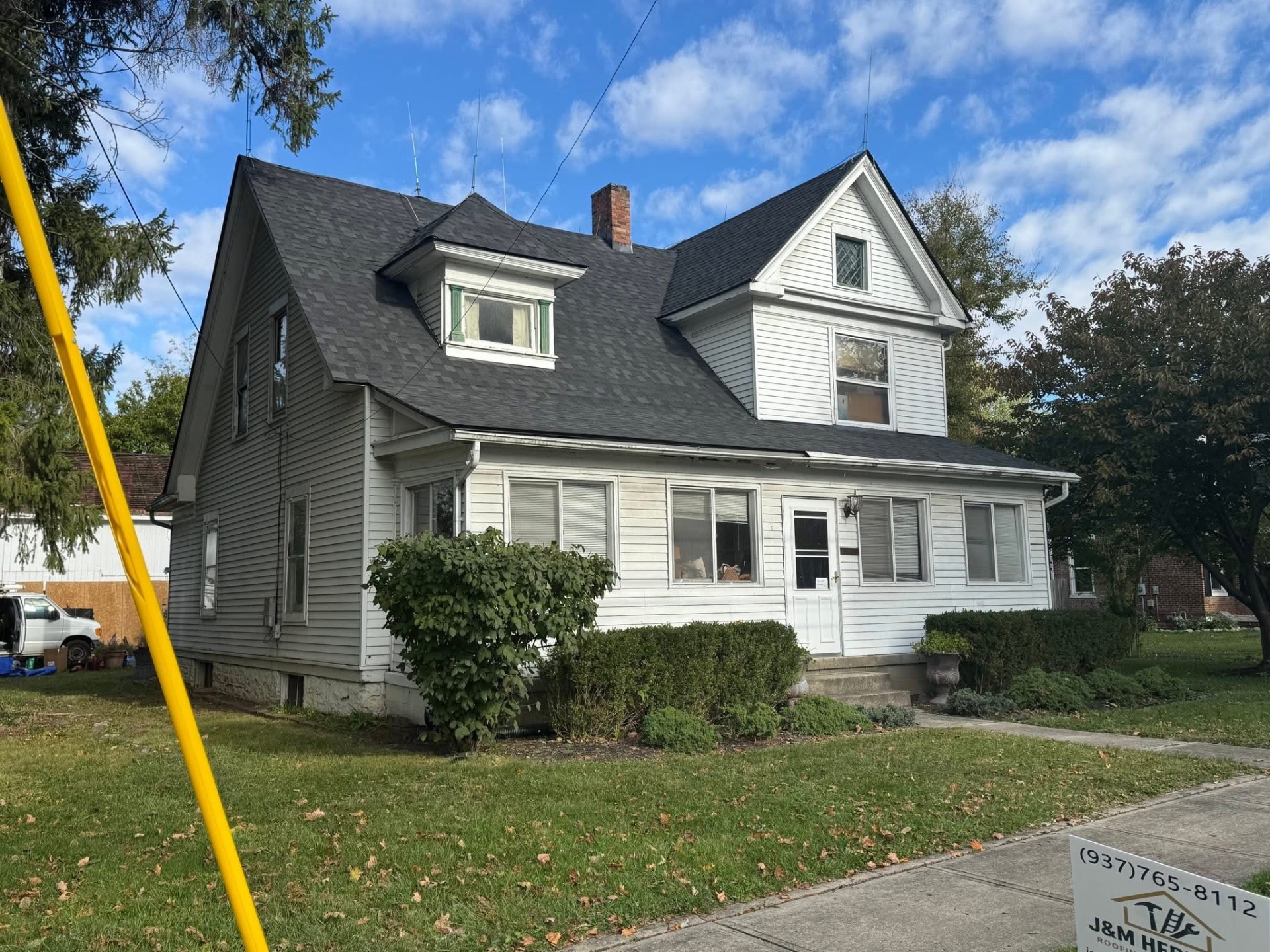 Completed roof replacement project by J&M Heritage